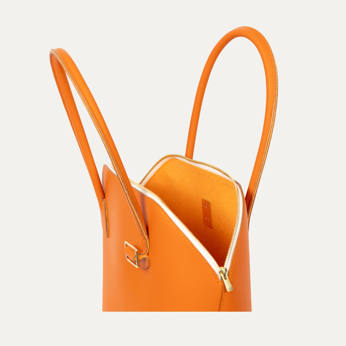 Sac Pecten Minimus INER en cuir de veau orange ouvert, vue de dessus